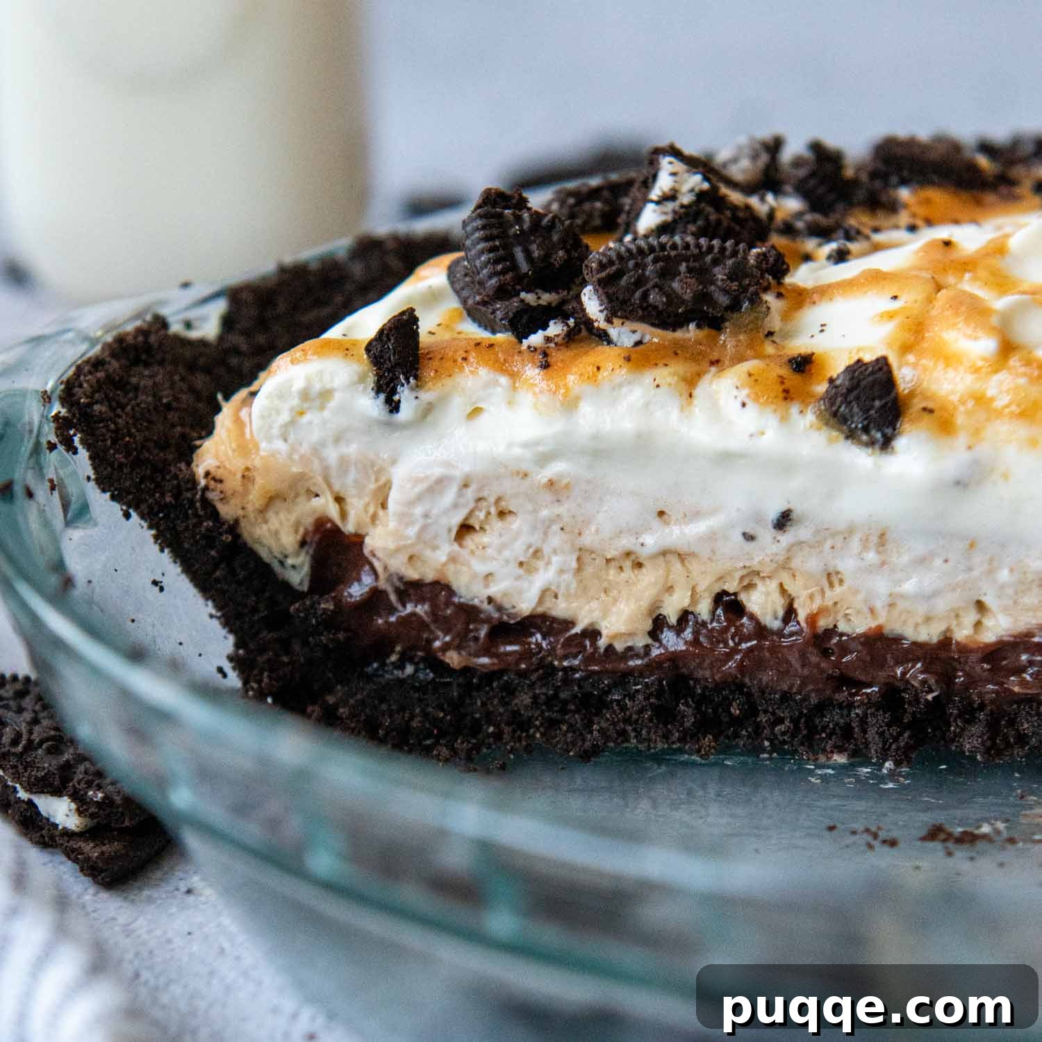 Easy Gluten-Free Oreo Crust for Perfect Slices 7 a gluten-free oreo pie filled with peanut butter filling and whipped cream.