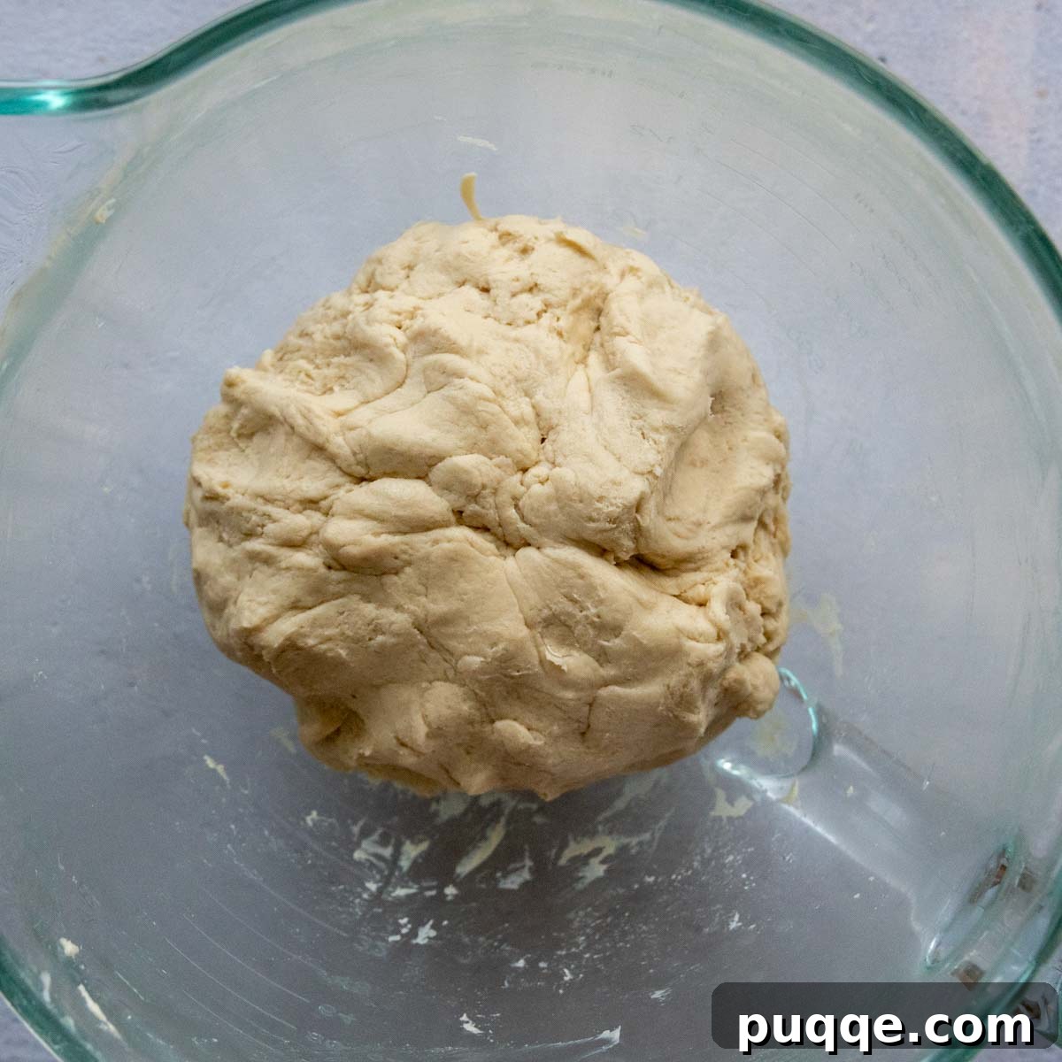 Pillowy Soft Gluten-Free Pretzels Simple Recipe 5 Gluten-free pretzel dough in a glass bowl before the rising process.
