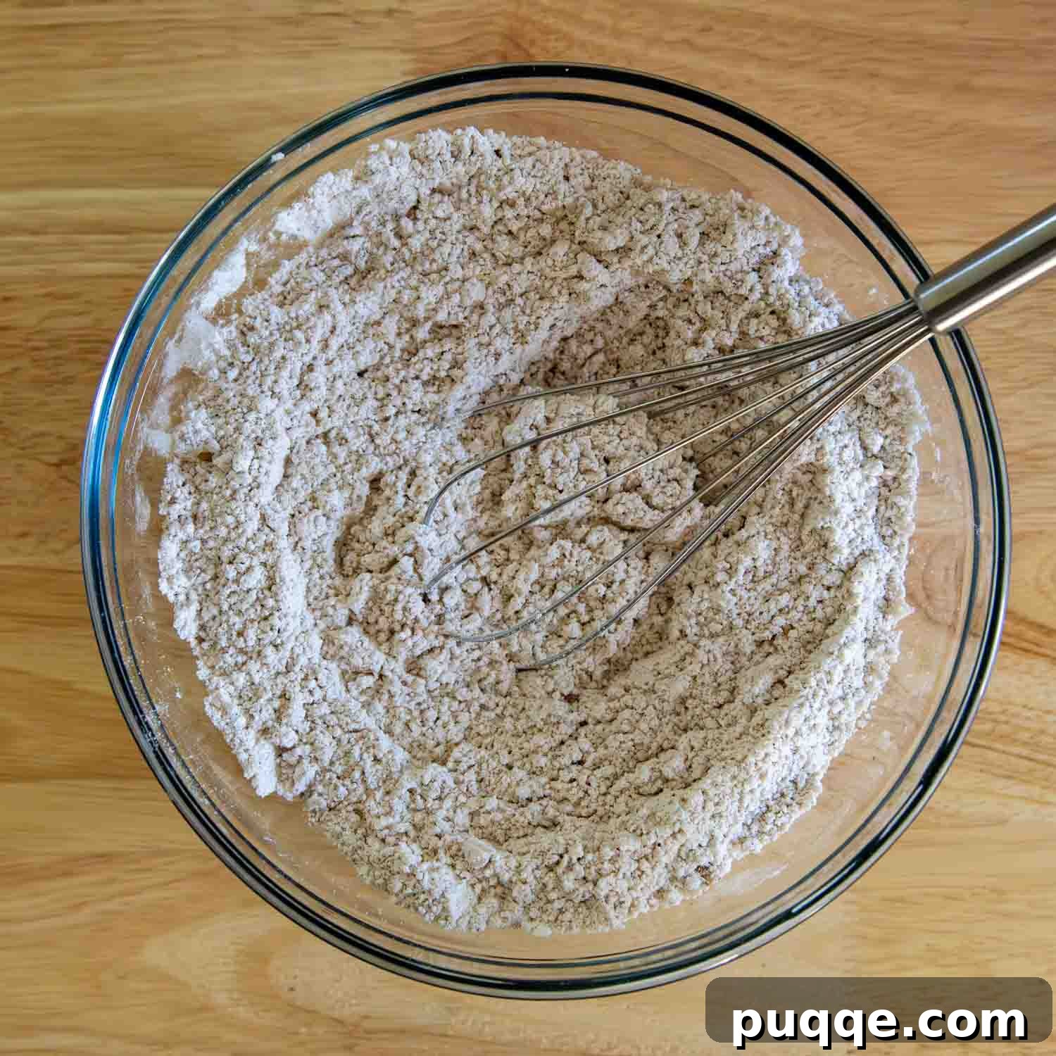 whisking dry ingredients together.