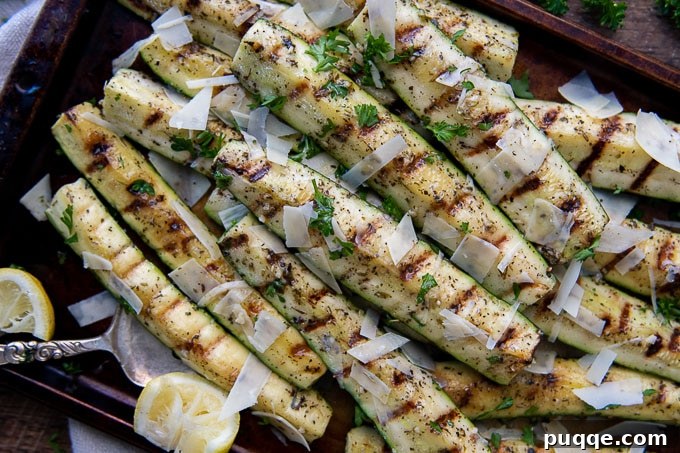 Summer's Best Grilled Zucchini and Squash 5 overhead shot of grilled zucchini on a baking sheet.
