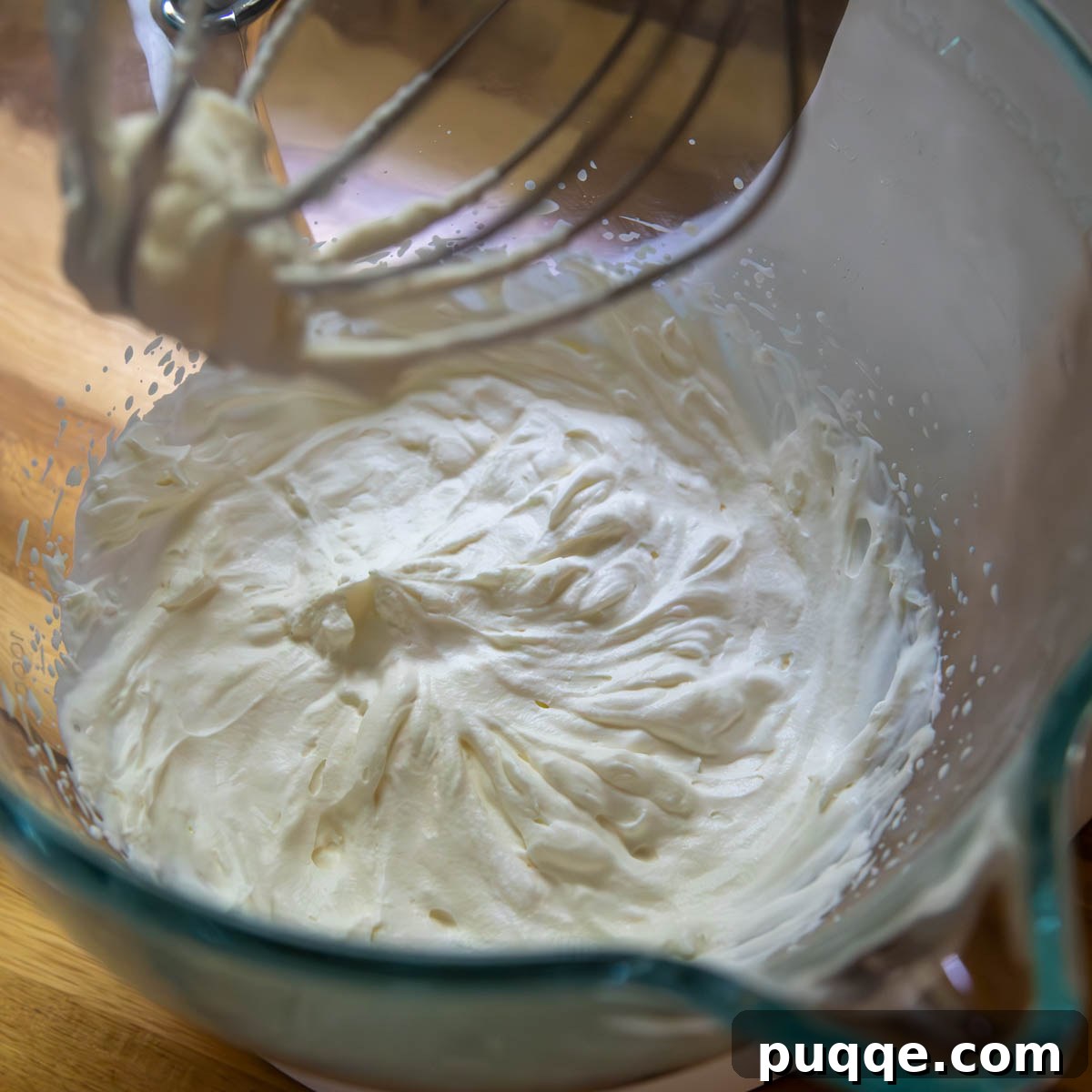 No Bake Chocolate Mint Dream Pie 3 Heavy cream being whipped into a thick, airy consistency, ready for the pie filling.