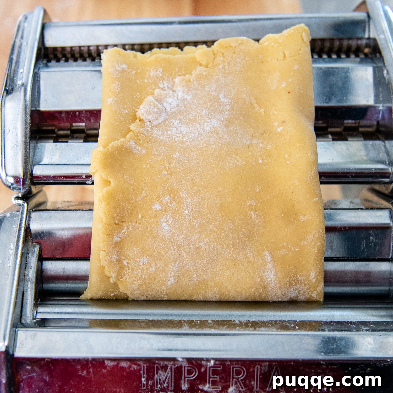 dough turned and going through pasta machine again.