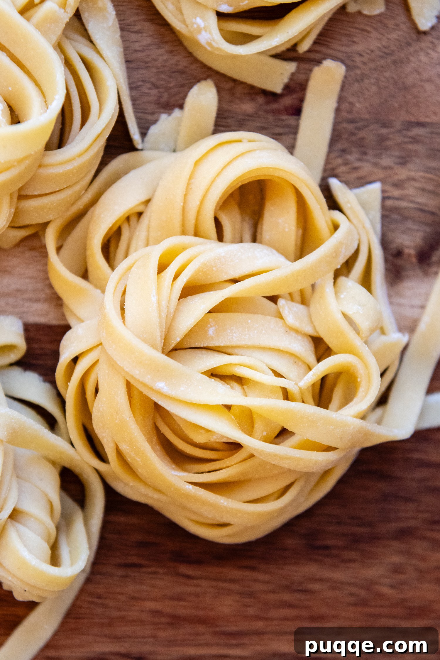 Closeup of folded ribbons of pasta.