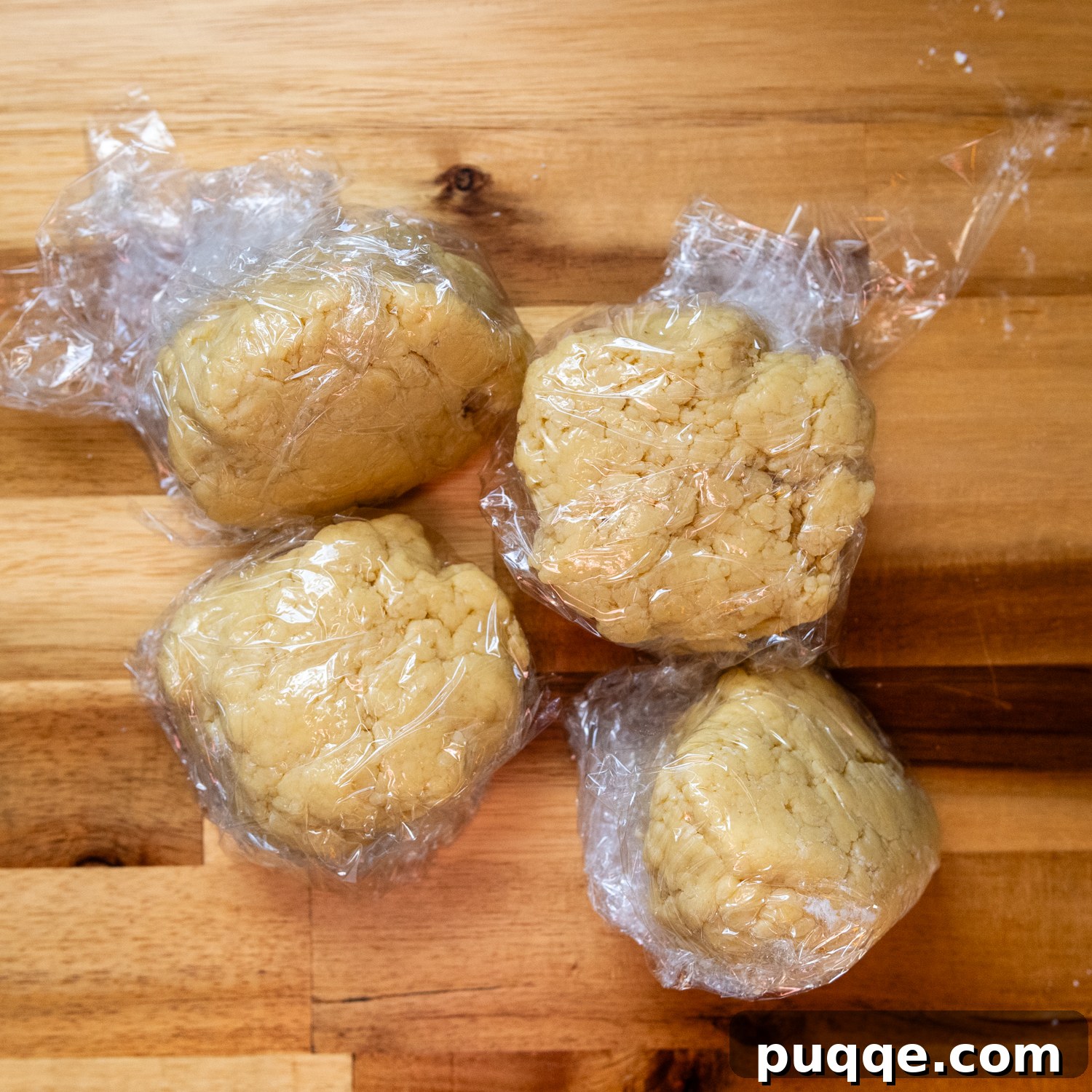 Pasta dough wrapped in plastic.