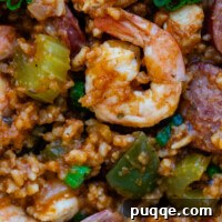 Gluten-Free Jambalaya in a bowl with a spoon.