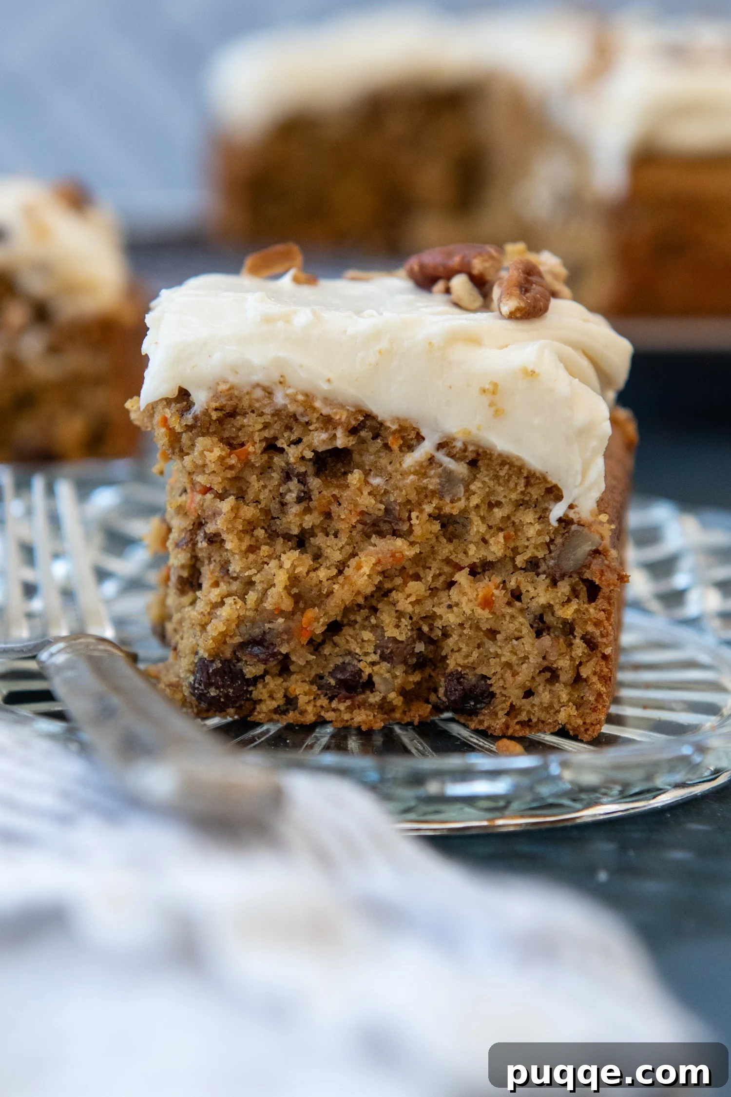 Heavenly Oat Flour Carrot Cake Unbelievably Moist and Light 2 Slice of Oat Flour Carrot Cake sitting on a glass plate.