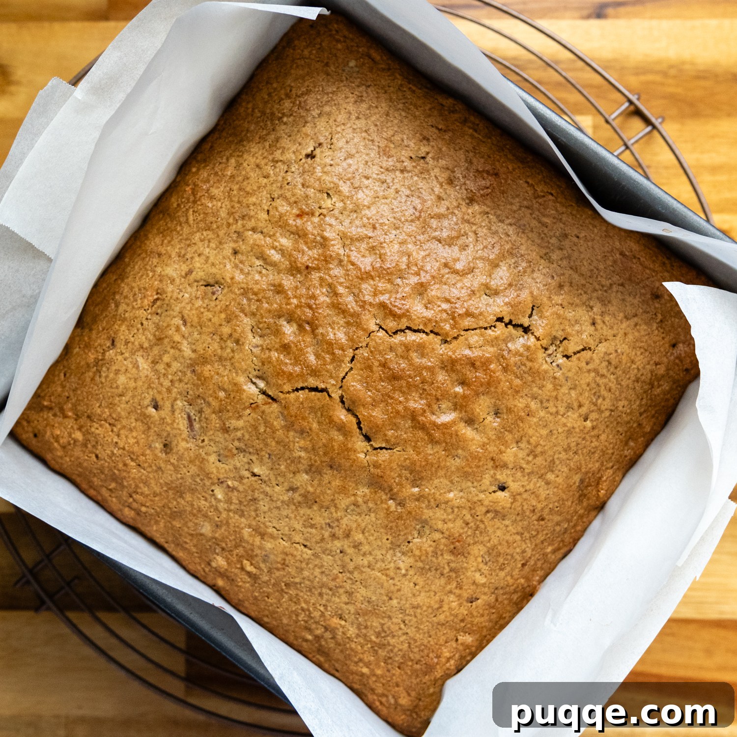 Heavenly Oat Flour Carrot Cake Unbelievably Moist and Light 5 Batter baked in a baking pan.