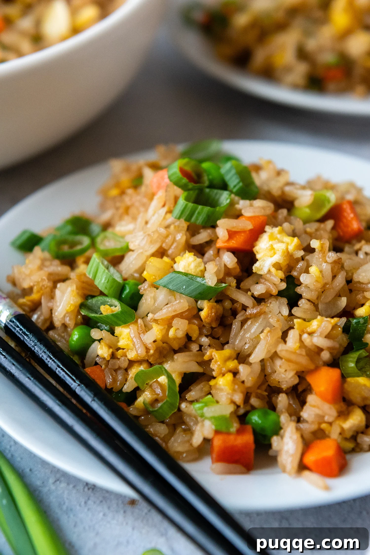 Quick Gluten-Free Fried Rice: Your Perfect Weeknight Meal 2 A beautifully plated bowl of gluten-free fried rice, garnished with green onions and ready to be enjoyed.