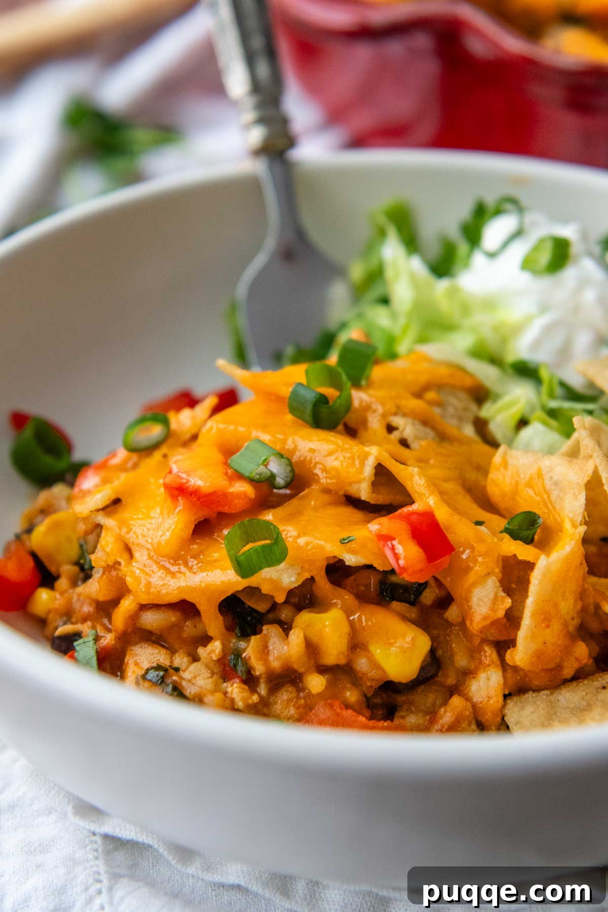 a serving of Mexican chicken rice casserole in a bowl.