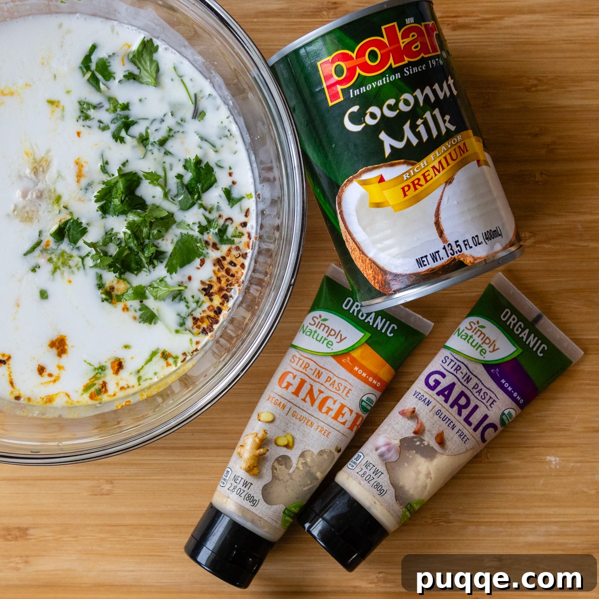 Ingredients for the coconut milk marinade, including ginger and garlic paste.