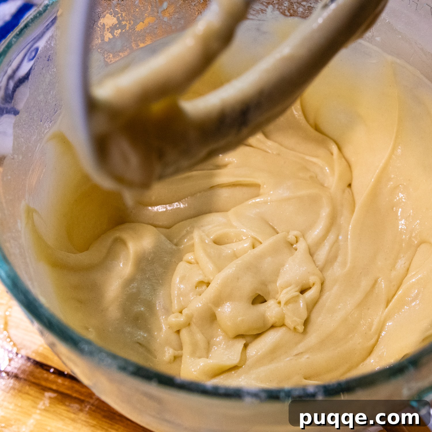 Batter mixed in a glass bowl.