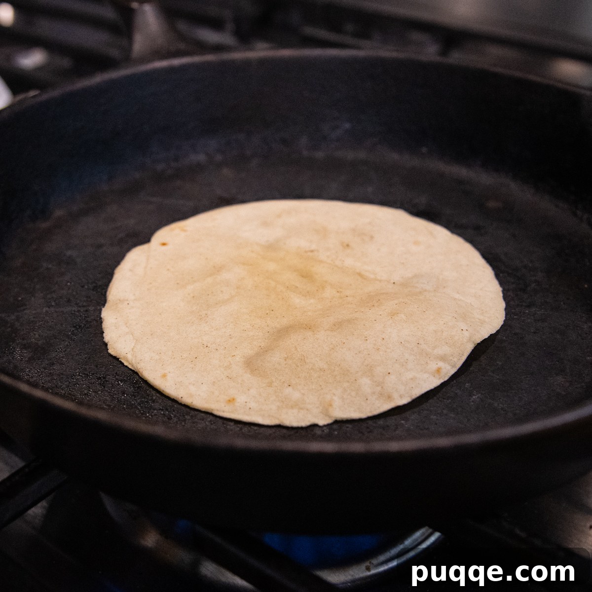 Tortilla in cast iron skillet.