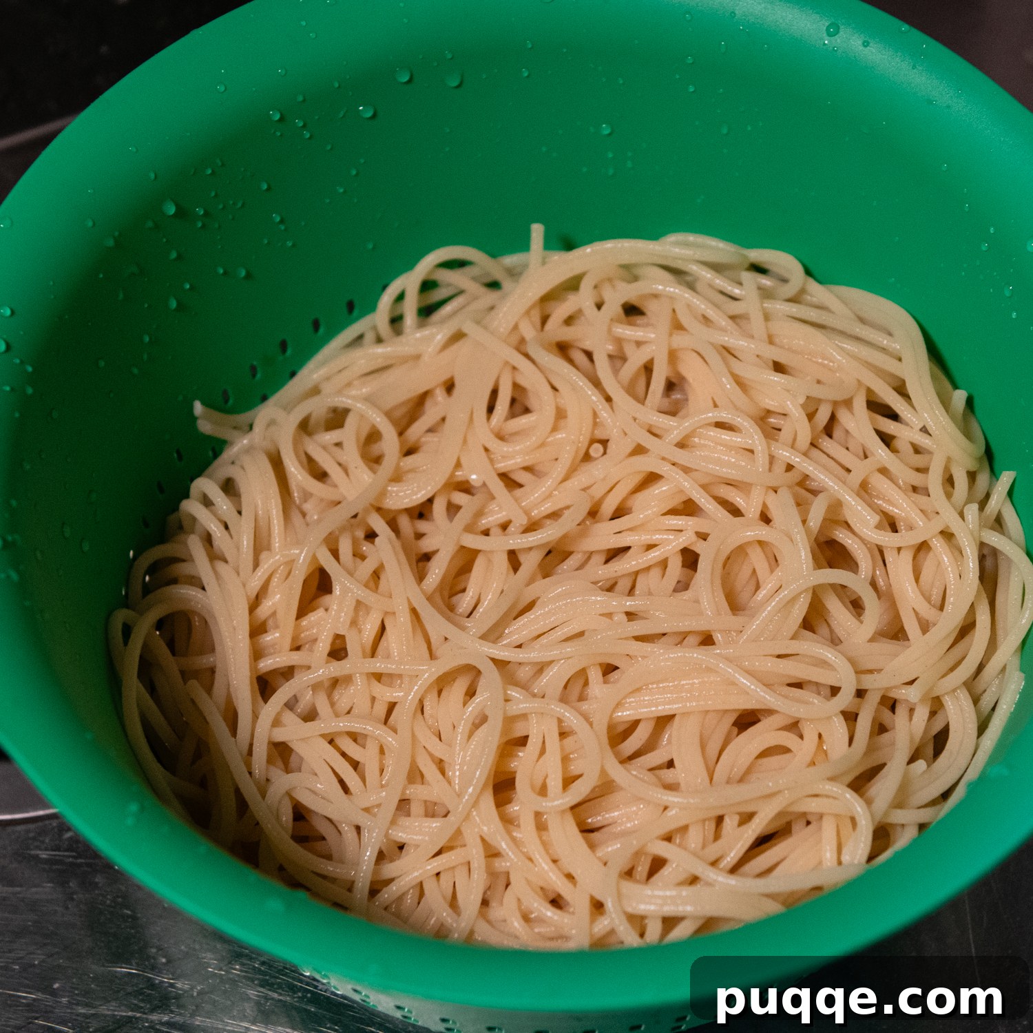 Scrumptious Gluten-Free Spaghetti Bake 4 Spaghetti noodles in a green bowl.