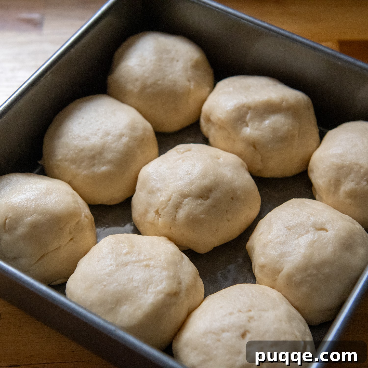 Gluten-Free Hawaiian Rolls: Squishy Soft in Just One Hour 6 Gluten-free Hawaiian dough balls after rising, showing increased size and readiness for baking.