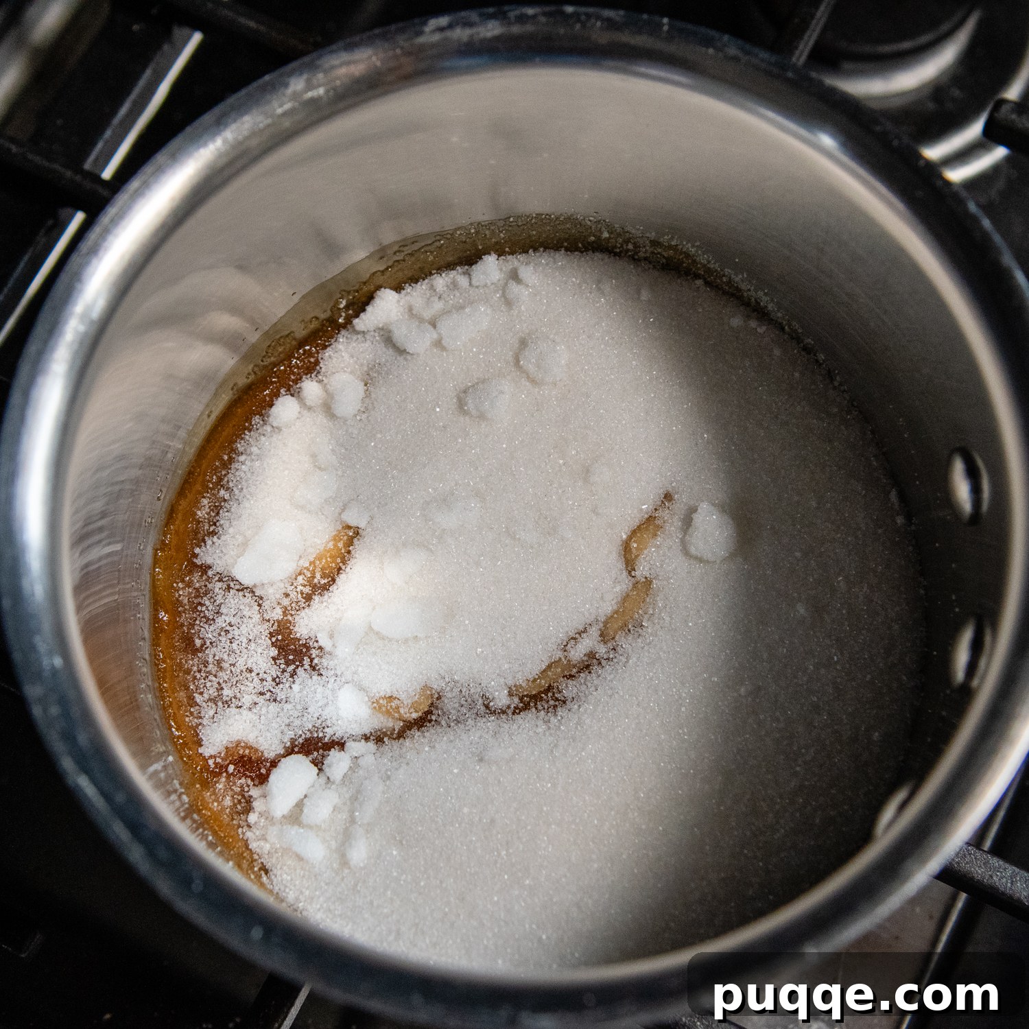 Double Coconut Flan Delight 3 Granulated sugar melting in a heavy-bottom saucepan to form caramel.