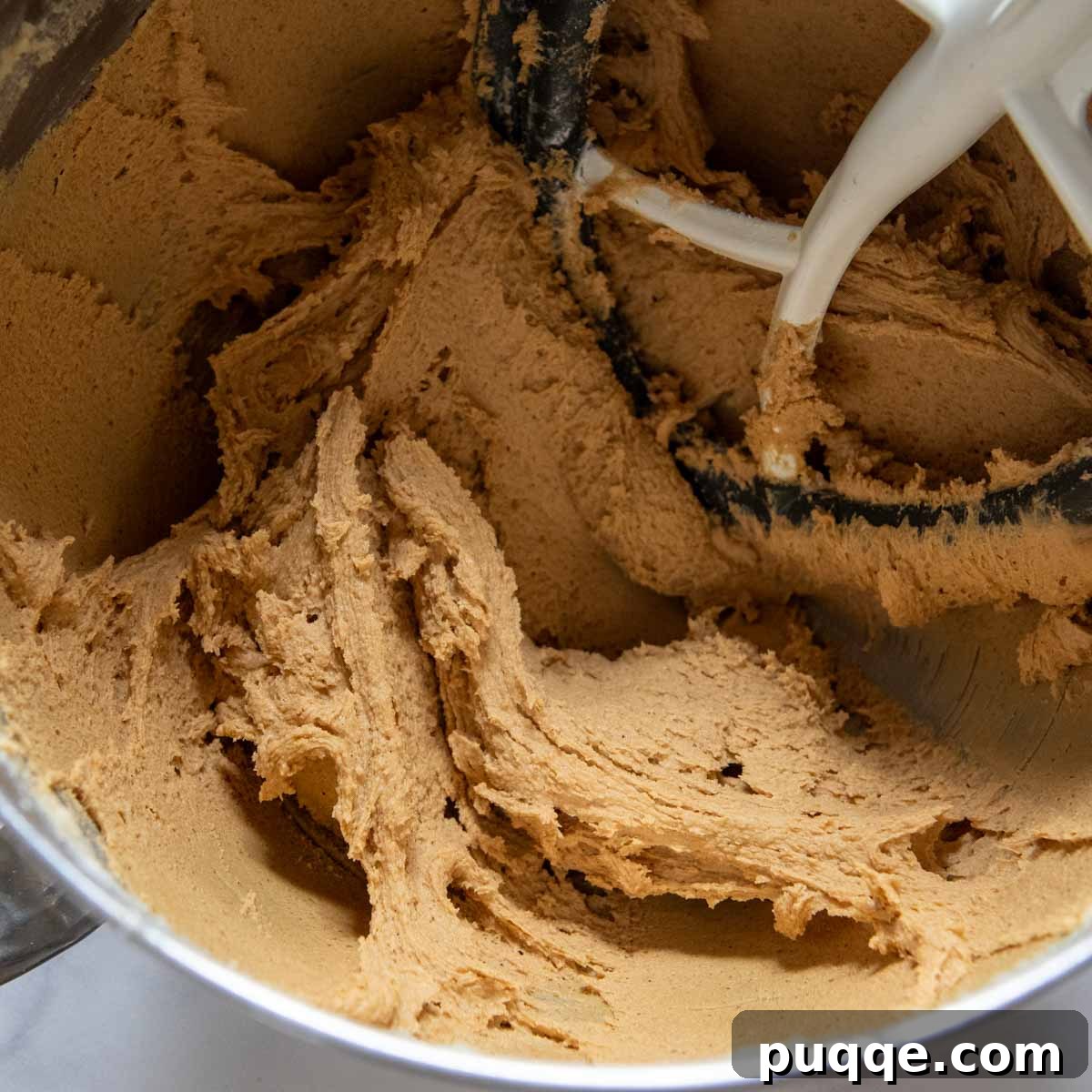 Finished gluten-free ginger snap dough after all dry ingredients, including flour, have been mixed in.