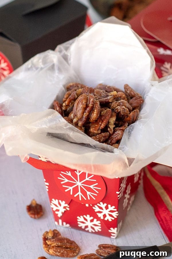 Effortless 5-Minute Candied Pecans 7 A beautifully arranged gift box filled with homemade candied pecans, ready to be presented to someone special.