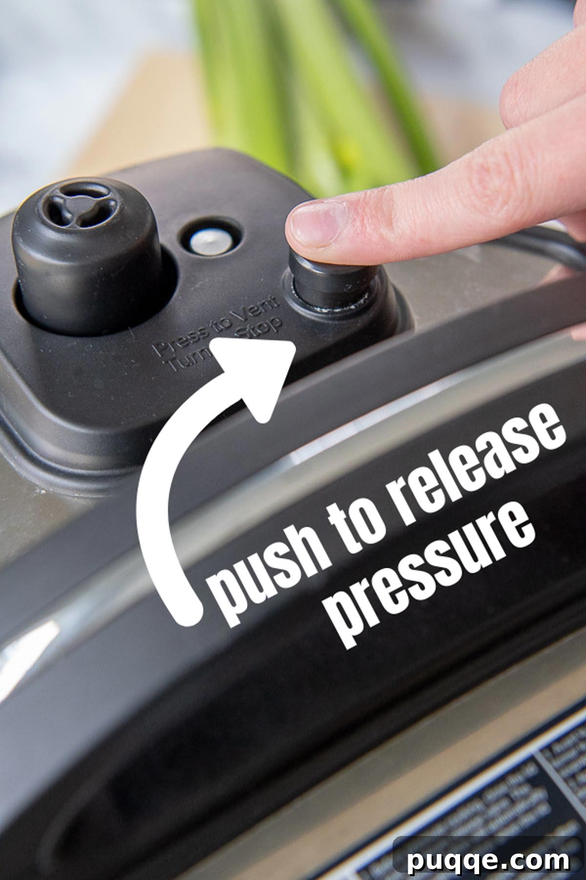 Mastering Your Instant Pot 4 a finger pushing a pressure cooker seal valve
