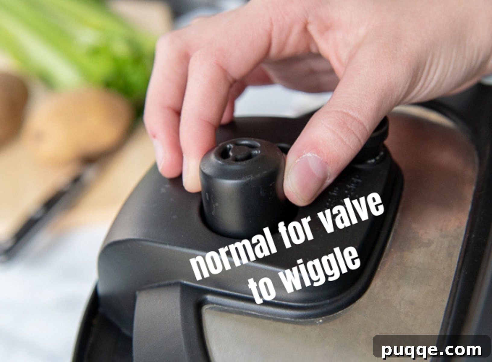 Mastering Your Instant Pot 5 a hand checking instant pot valve
