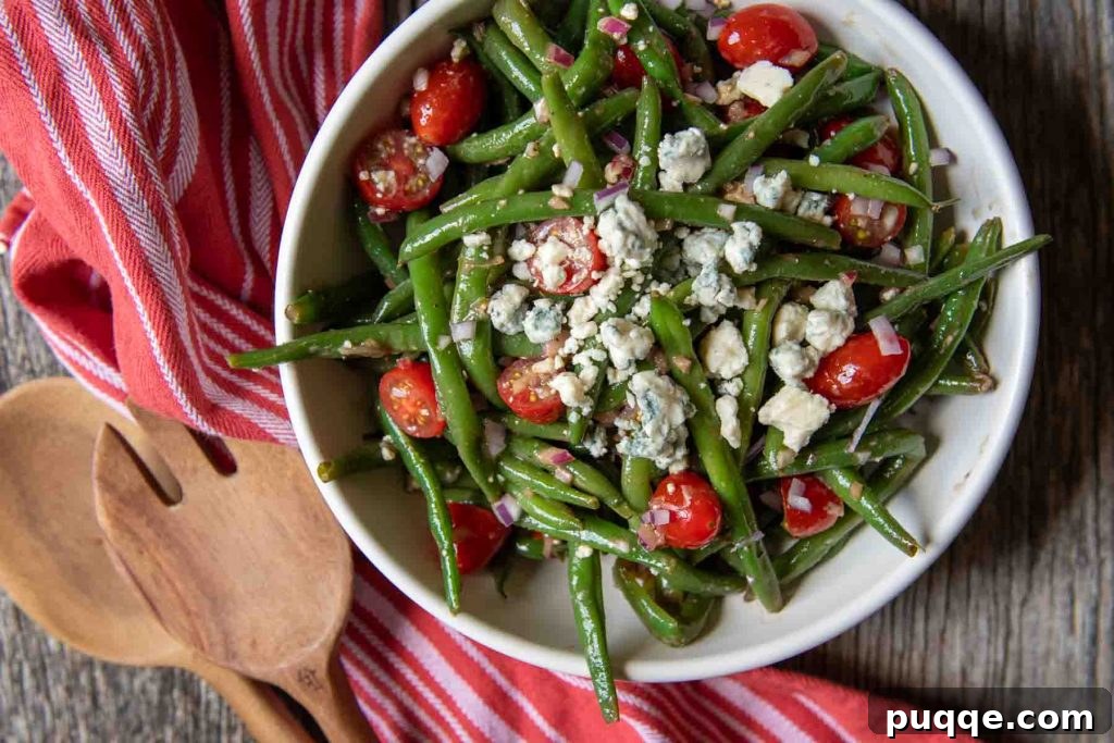 Tangy Green Bean Salad 6 close up landscape of green bean salad with red towel