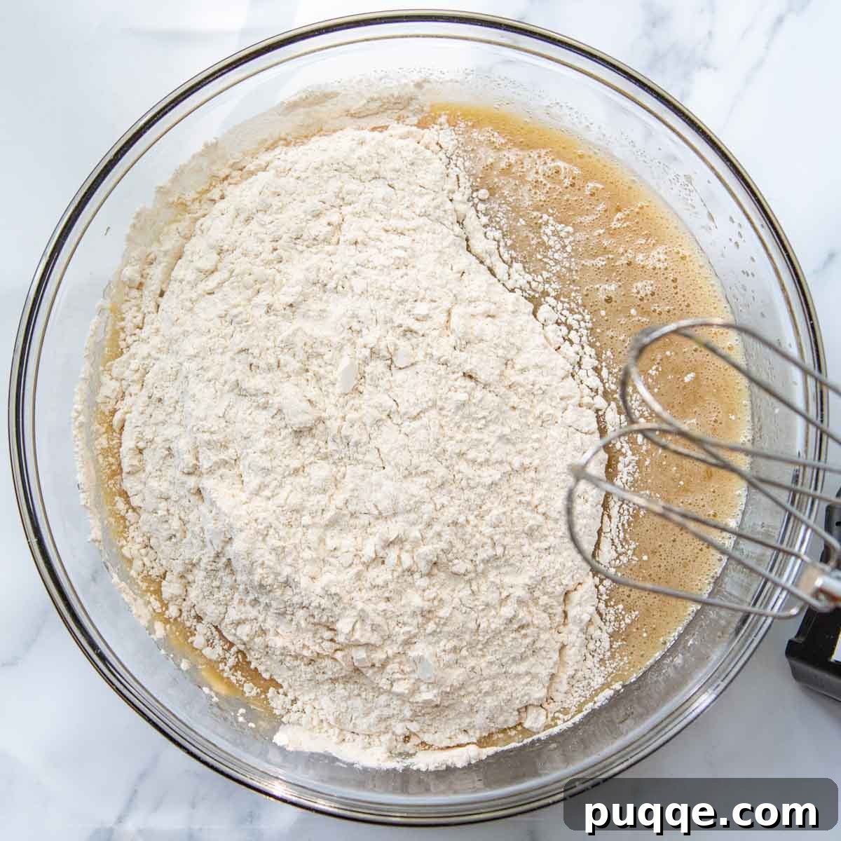 Brown Sugar Praline Glazed Apple Cake 6 The dry and wet ingredients for the apple cake batter are mixed together until just combined.