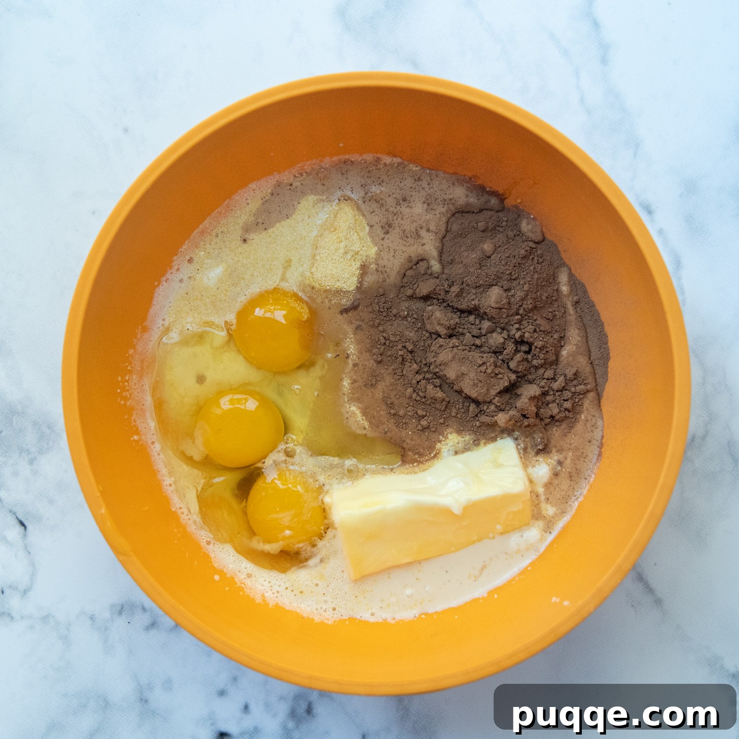 Decadent Southern Chocolate Chess Pie 4 the filling for the pie in a mixing bowl.