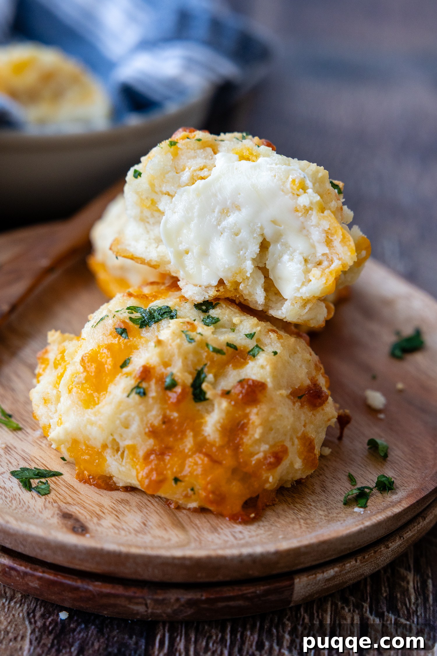 Restaurant Style Buttery Gluten-Free Cheddar Bay Biscuits 7 A perfectly baked gluten-free cheddar biscuit, showcasing its tender crumb and golden crust.