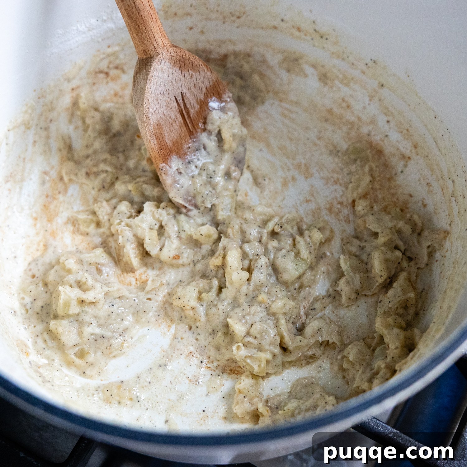 Cozy Gluten-Free Chicken and Biscuits 5 Flour and butter combined in a pan, forming a roux for the creamy filling.