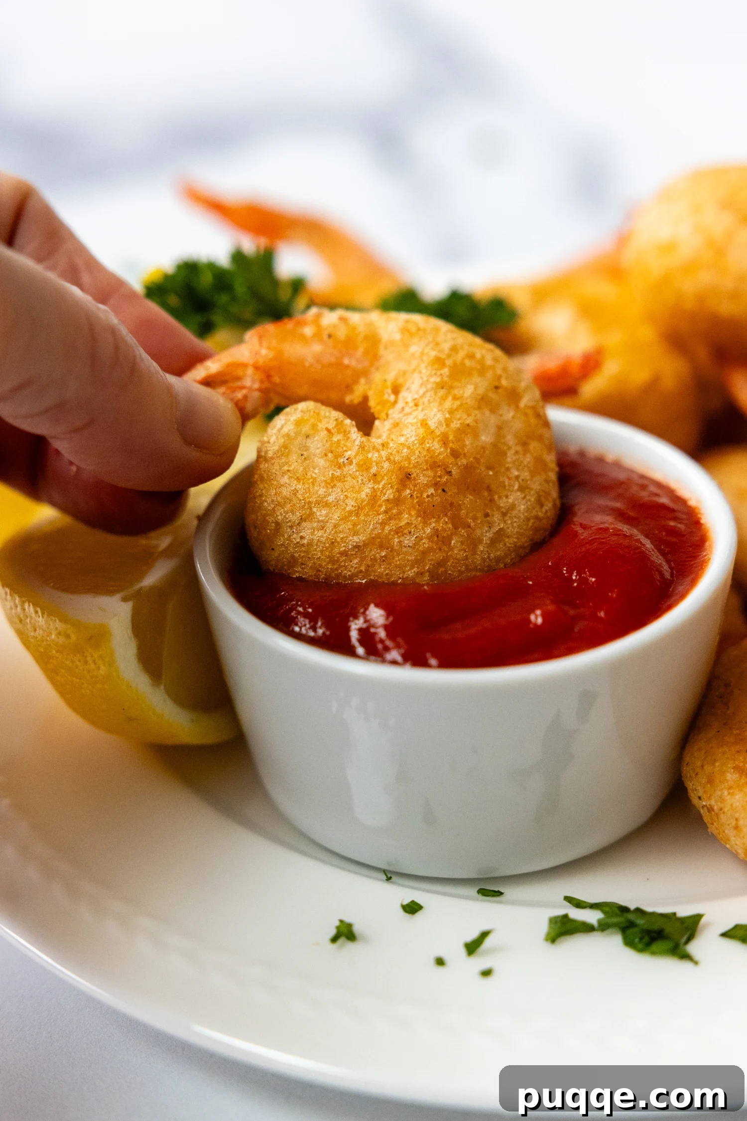 Golden Crispy Gluten-Free Shrimp 2 Golden-brown, perfectly crispy gluten-free fried shrimp on a plate, ready to be enjoyed.
