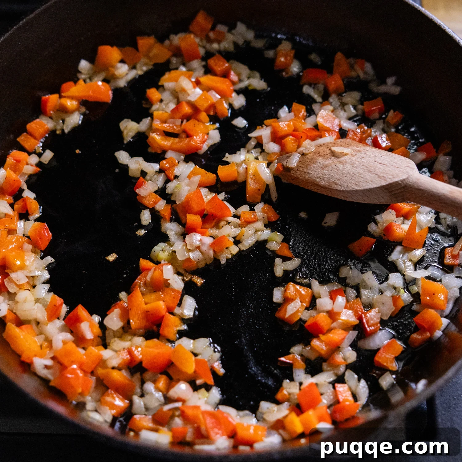 Golden Brown Flourless Salmon Patties 4 Veggies being sautéed in a skillet.